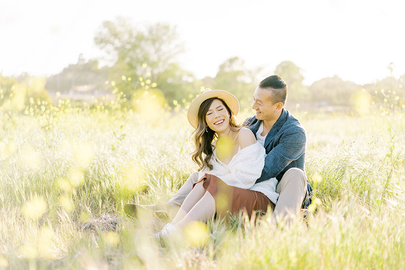 open fields yellow flowers engagement session